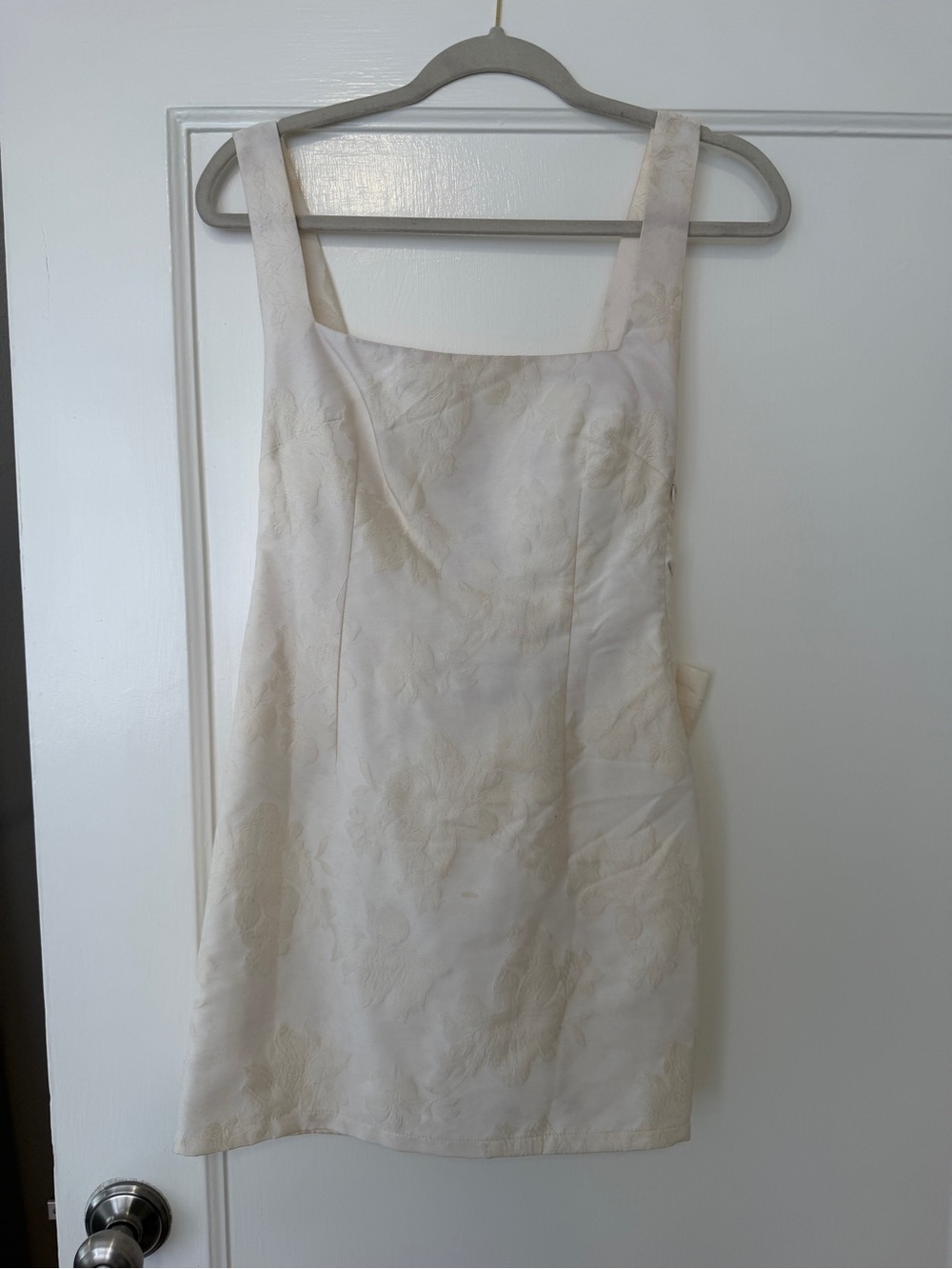 Mini dress with bow on back